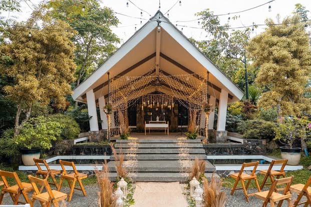 An open-air wooden chapel pavilion ceremony space