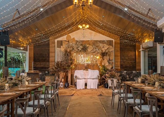 A real Casa de Corazon barn-style reception styled with string lights