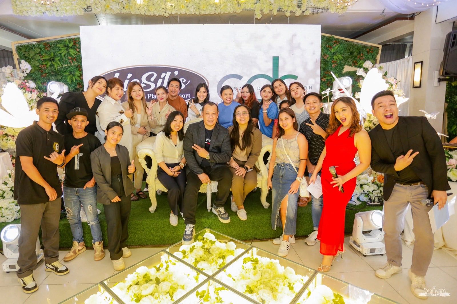 The real Casa de Corazon team posed together at an event